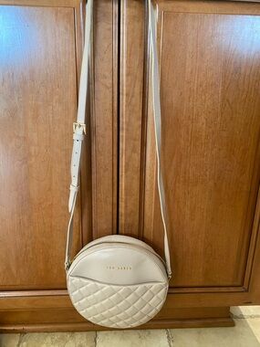 Ted Baker Pale Pink Quilted Round Crossbody with Gold Logo